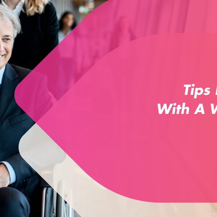A man sat in a wheelchair getting ready for his flight.
