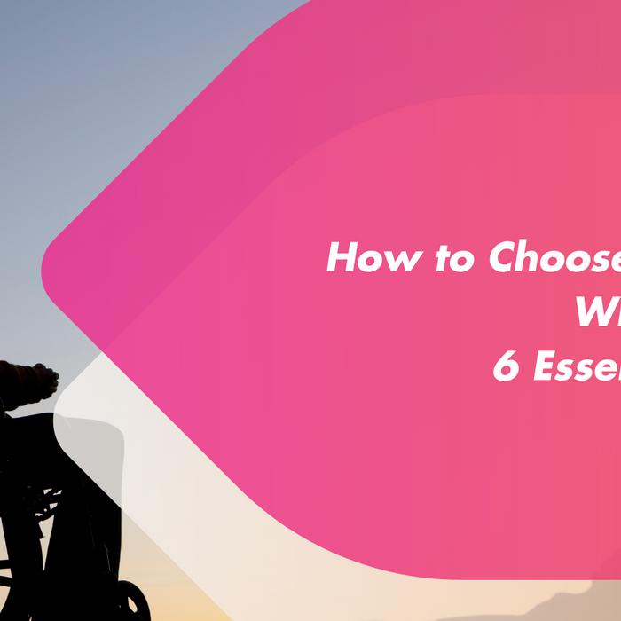 The silouhette of a lady sat in a wheelchair.
