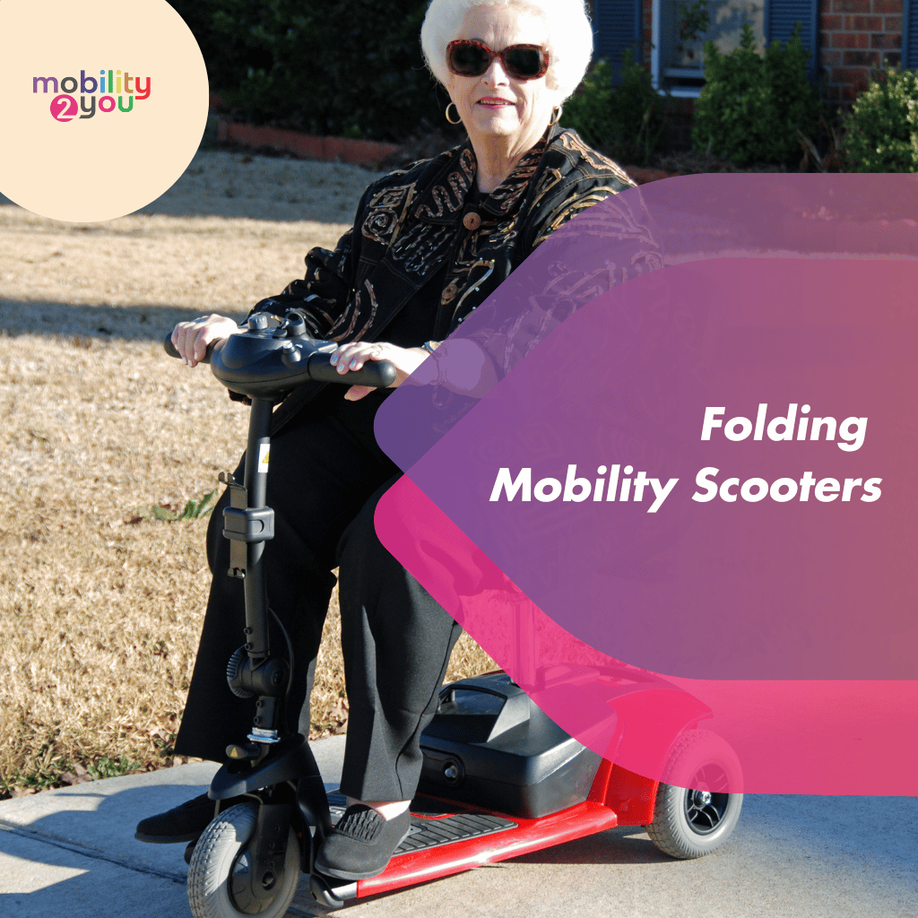 A lady sat on a folding mobility scooter after removing it from her car.