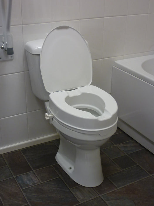 Raised Toilet Seat 4" With Lid - Mobility2you - discount wholesale prices - from Drive DeVilbiss Healthcare